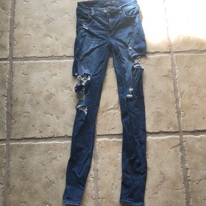 0 american eagle super stretch destroyed jeans.